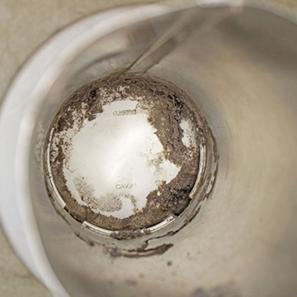 Highly flammable lint buildup in dryer vent posing fire risk.