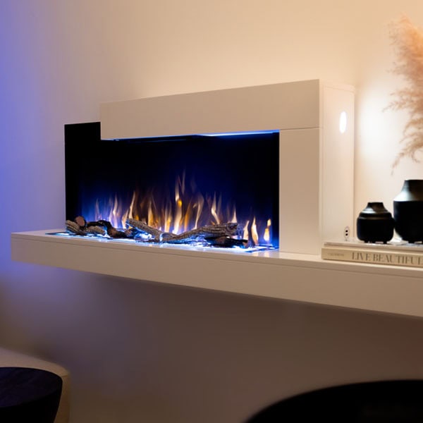 A sleek electric fireplace illuminated by a calming blue light, enhancing the modern decor of the space.
