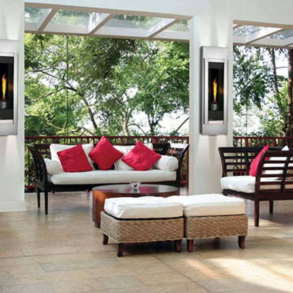 An inviting patio with comfortable furniture and gas fireplaces, ideal for enjoying evenings outdoors