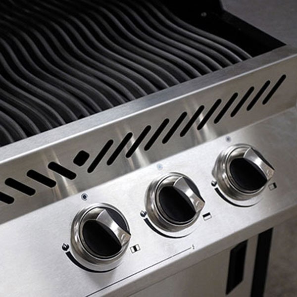 Detailed view of a four-burner gas grill, highlighting its burners and overall structure for grilling enthusiasts.
