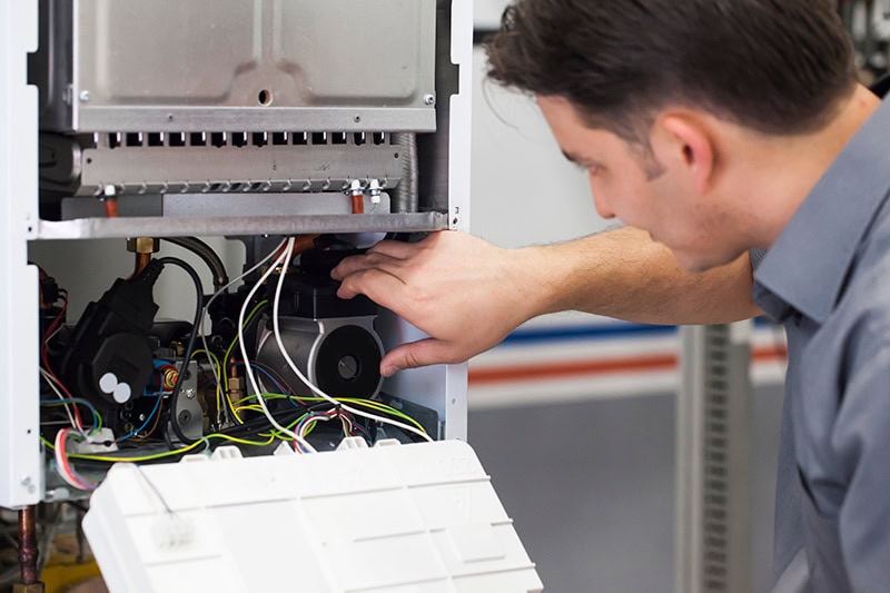 Technician working on system.