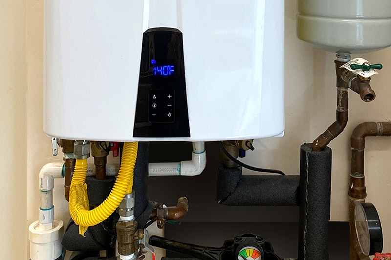 Tankless vs. Traditional Water Heaters: Which is Best for Your Home? The screen on a tankless water heater.